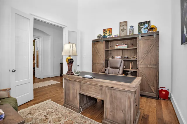 a room with a washing machine and cabinets