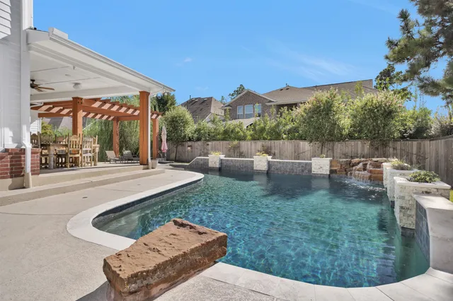 a view of a patio with couches chairs and a table and chairs