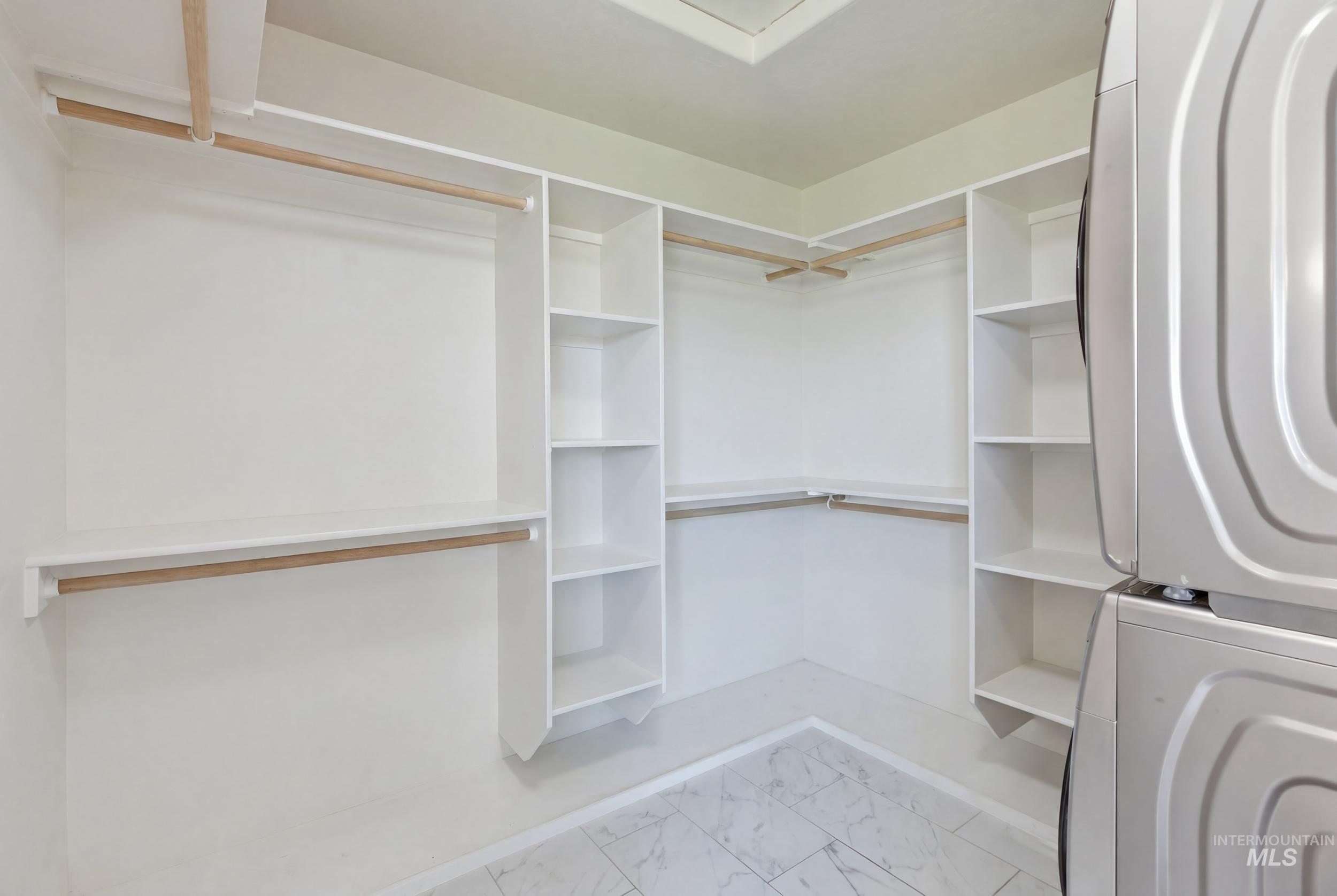 7781 Redmon Road Caldwell, ID 83607 - Photo 45 of 50 Bright living space featuring light gray carpeting and a ceiling fan