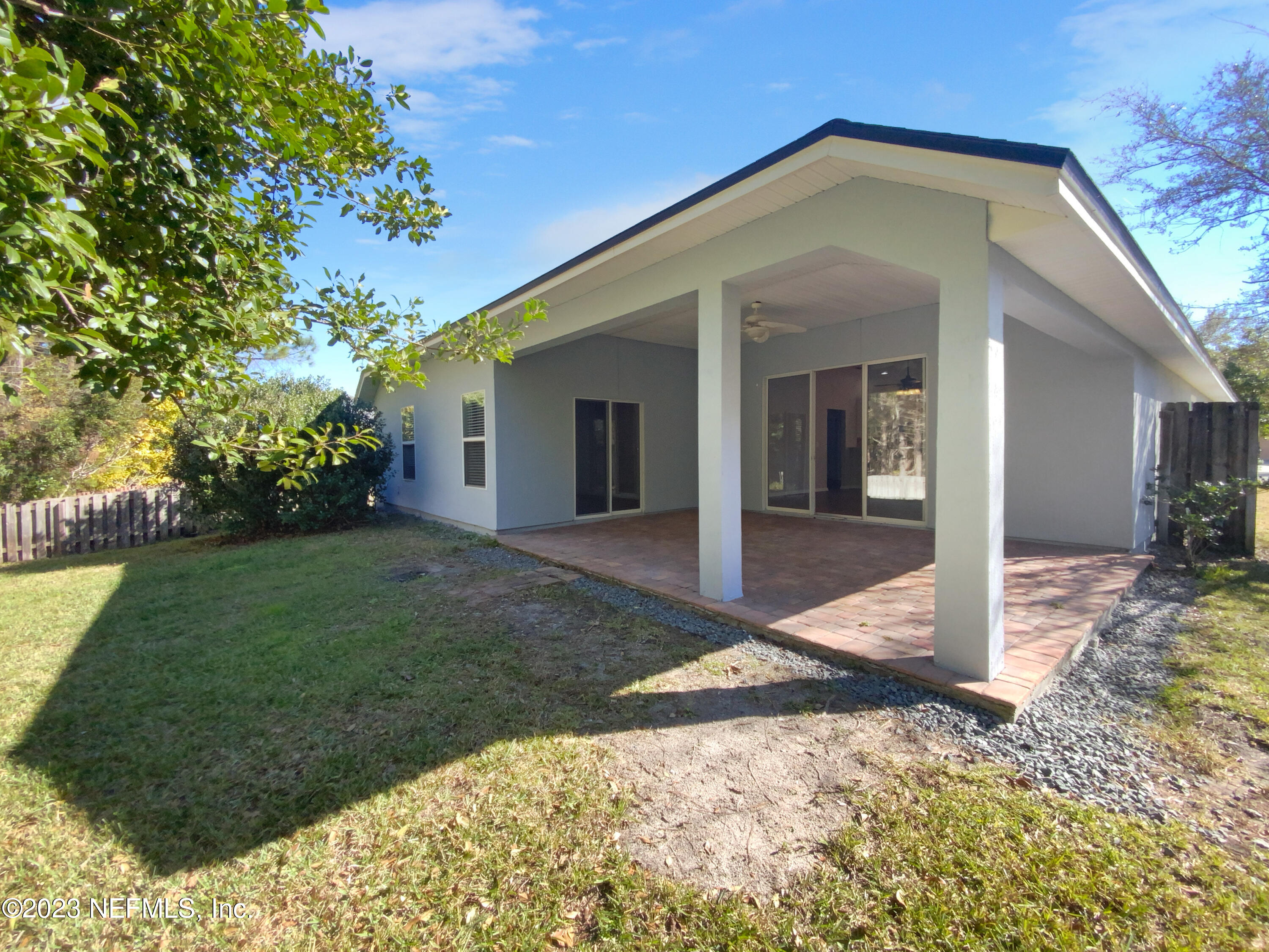 5783 Brush Hollow Road Jacksonville, FL 32258 - Photo 19 of 19 a view of a house with a yard