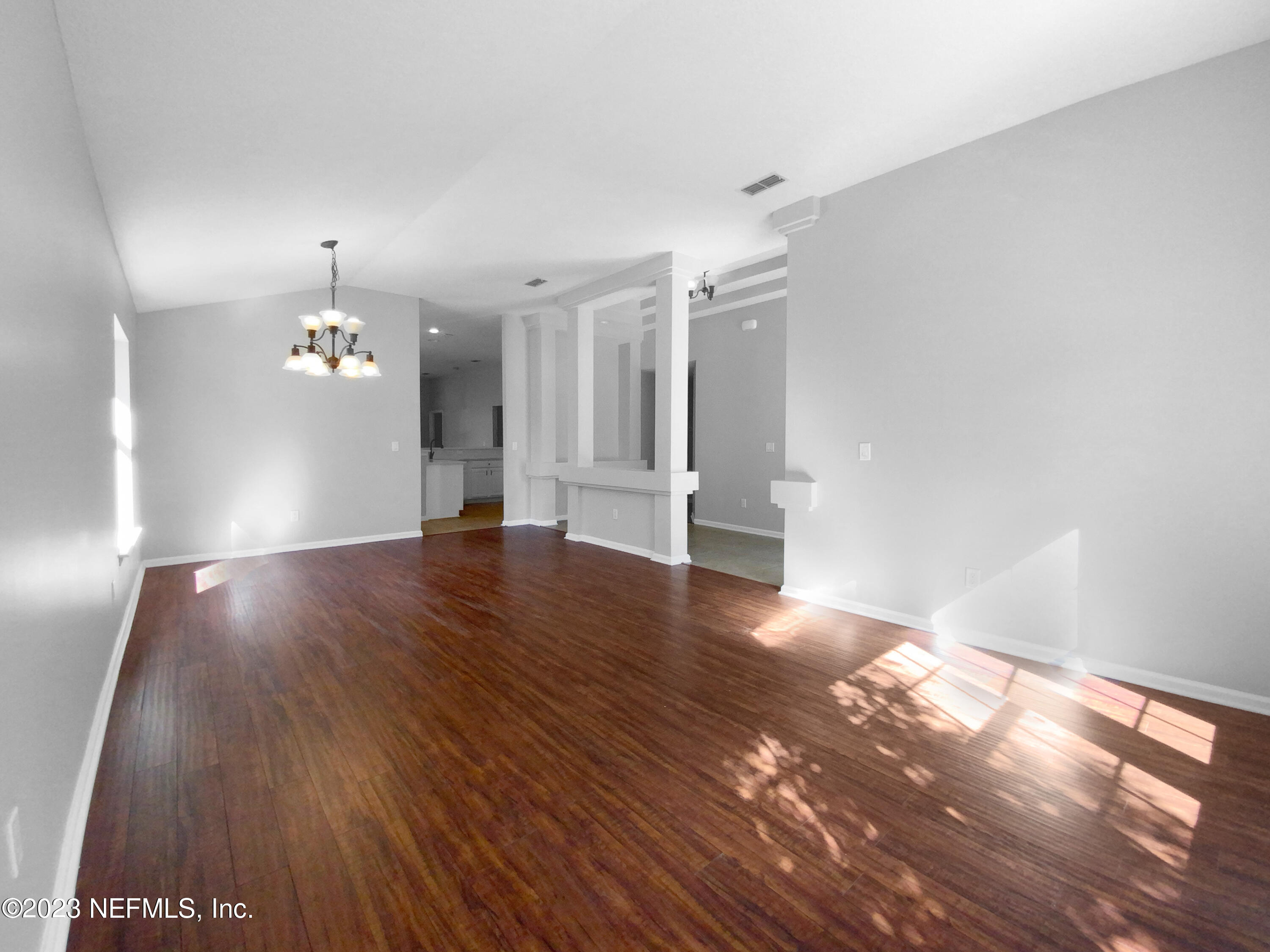 5783 Brush Hollow Road Jacksonville, FL 32258 - Photo 4 of 19 a view of empty room with wooden floor