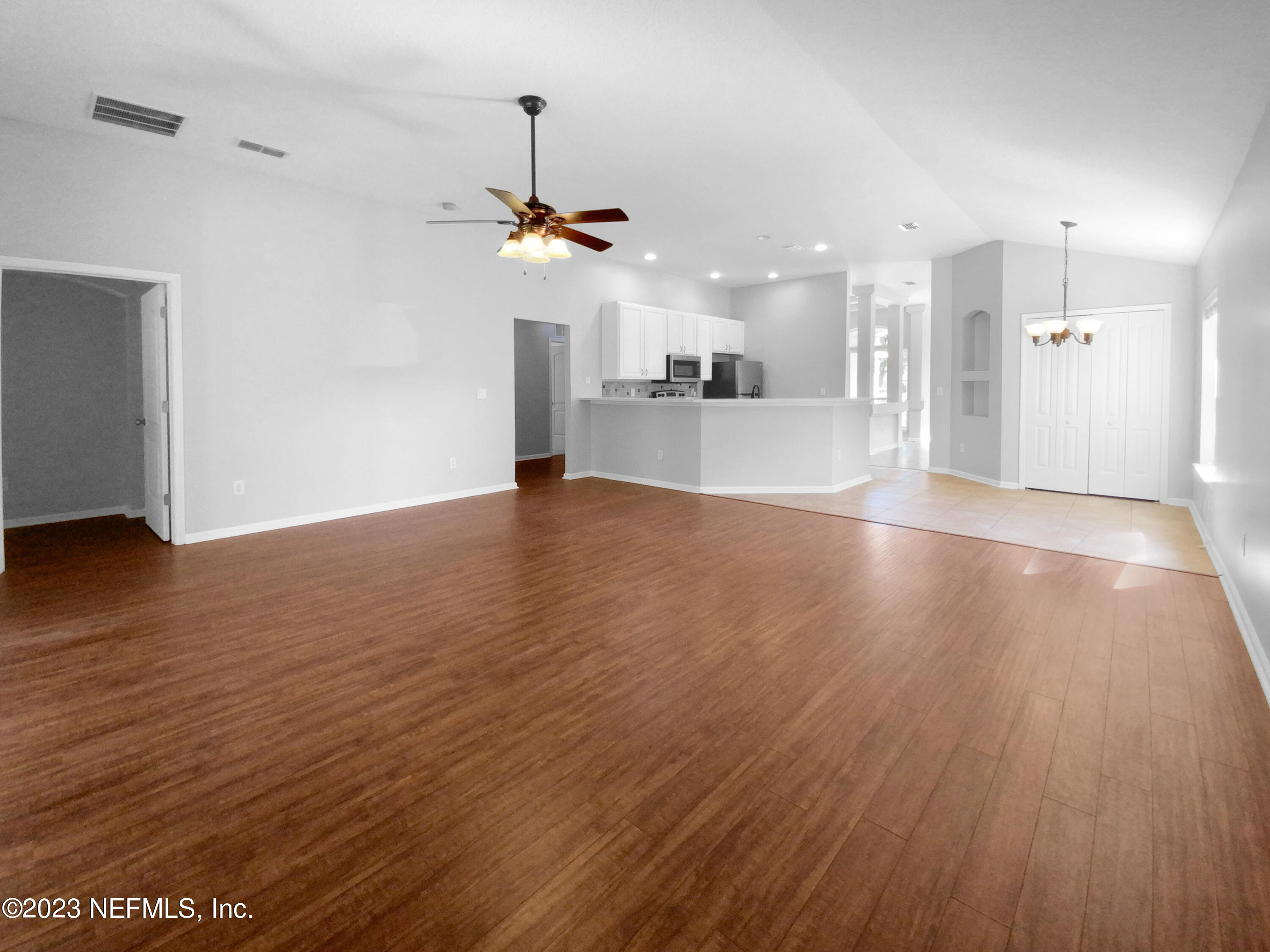 5783 Brush Hollow Road Jacksonville, FL 32258 - Photo 7 of 19 a view of a kitchen with a sink and wooden floor