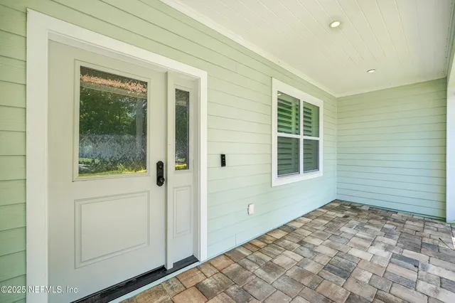 a room with furniture and a window