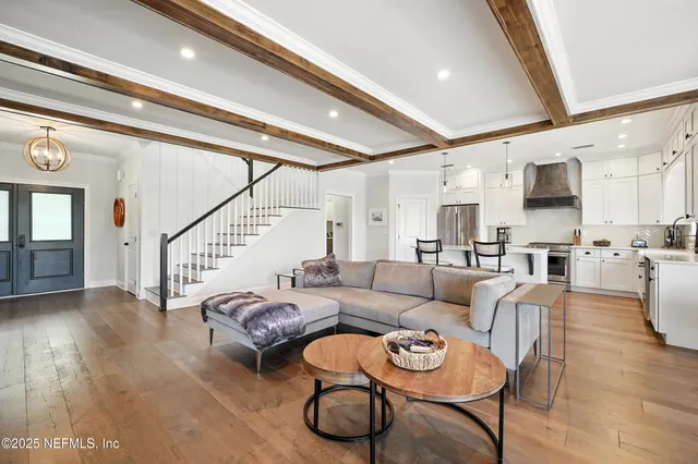 a view of a dining room with furniture and window