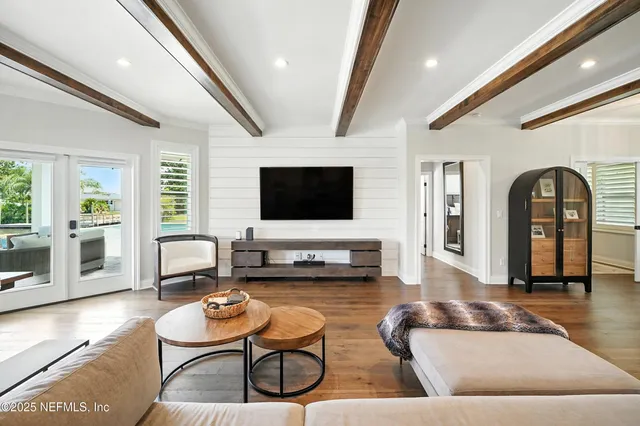 a kitchen with a sink cabinets and a window