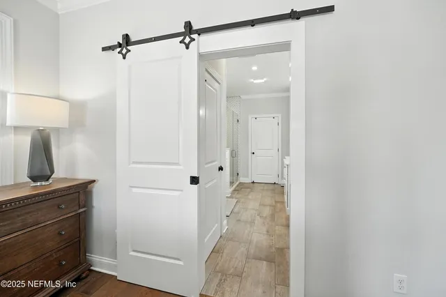 a bedroom with a bed and a closet