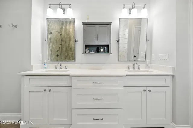 a bedroom with a bed and a ceiling fan