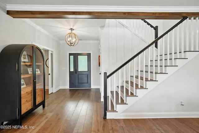 a open kitchen with a table and chairs