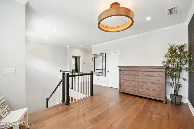 a view of a house with backyard sitting area and swimming pool