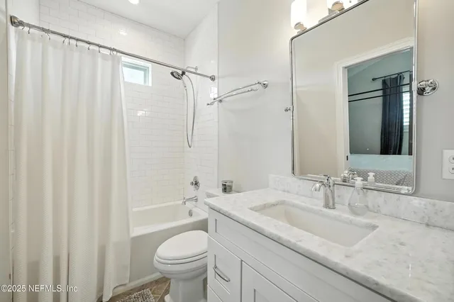 an aerial view of a pool patio swimming pool and outdoor seating