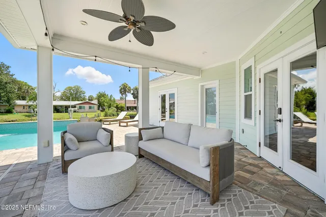 an aerial view of residential houses with outdoor space