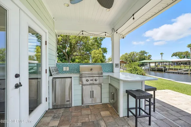 an aerial view of residential building and lake