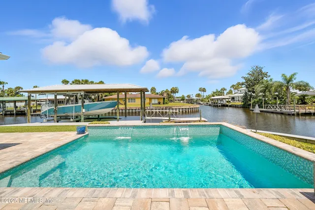 a balcony with furniture and garden