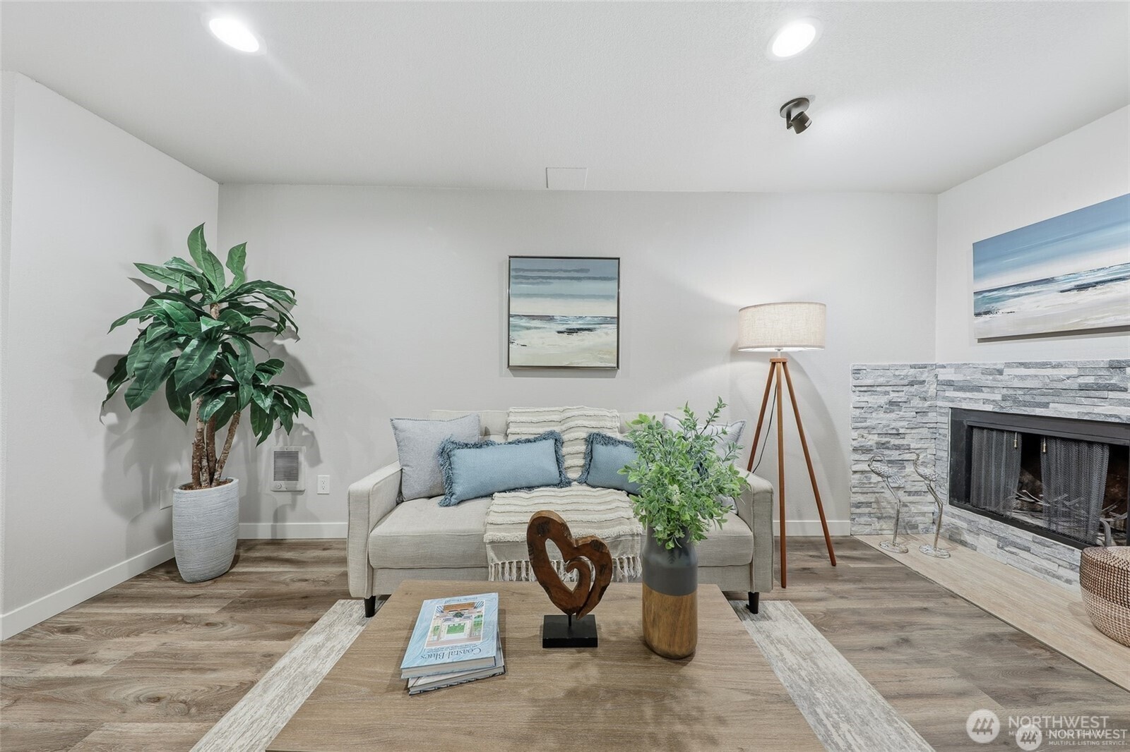 1940 North Northgate Way Seattle, WA 98133 - Photo 6 of 22 a living room with furniture and a fireplace