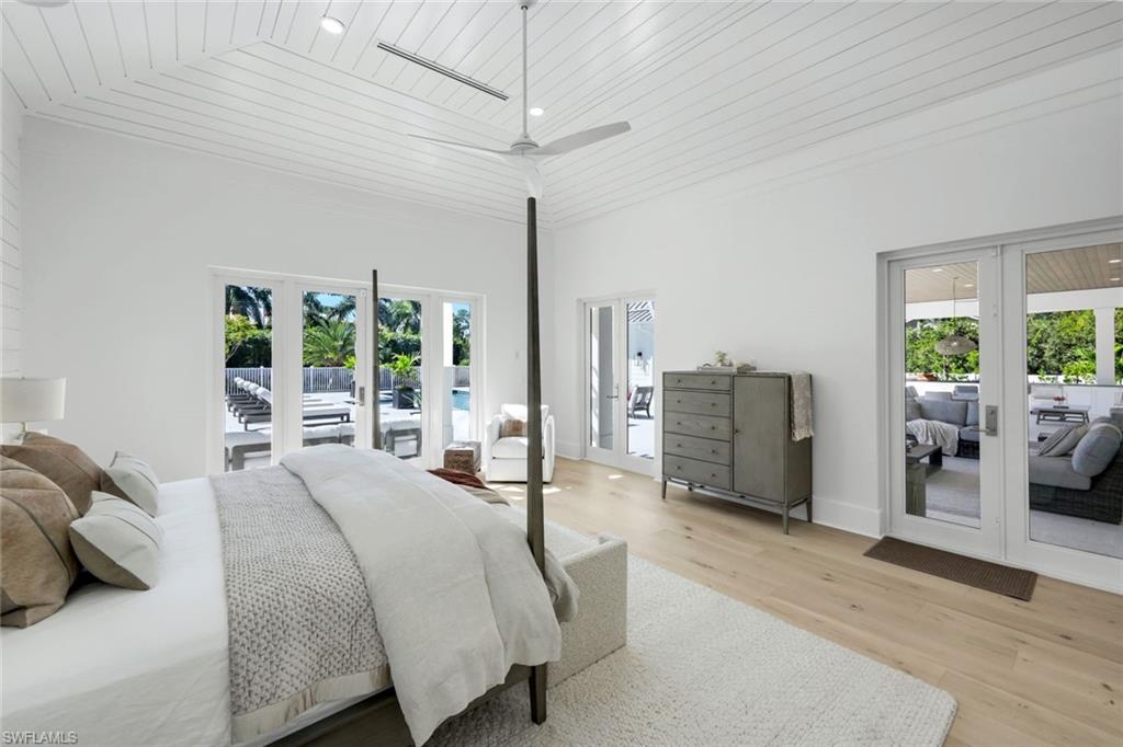 3136 Ravenna Avenue Naples, FL 34120 - Photo 28 of 50 Bedroom featuring access to exterior, french doors, light wood-type flooring, wood ceiling, and a ceiling fan