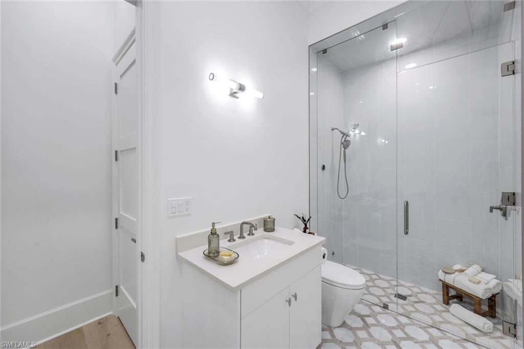 3136 Ravenna Avenue Naples, FL 34120 - Photo 36 of 50 Full bath featuring vanity and a stall shower