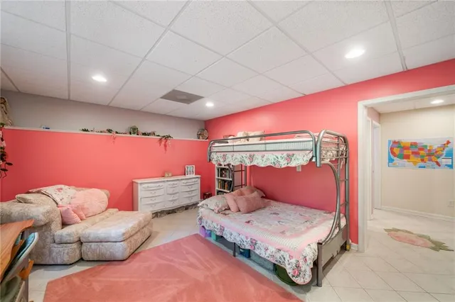 a bedroom with furniture and a couch