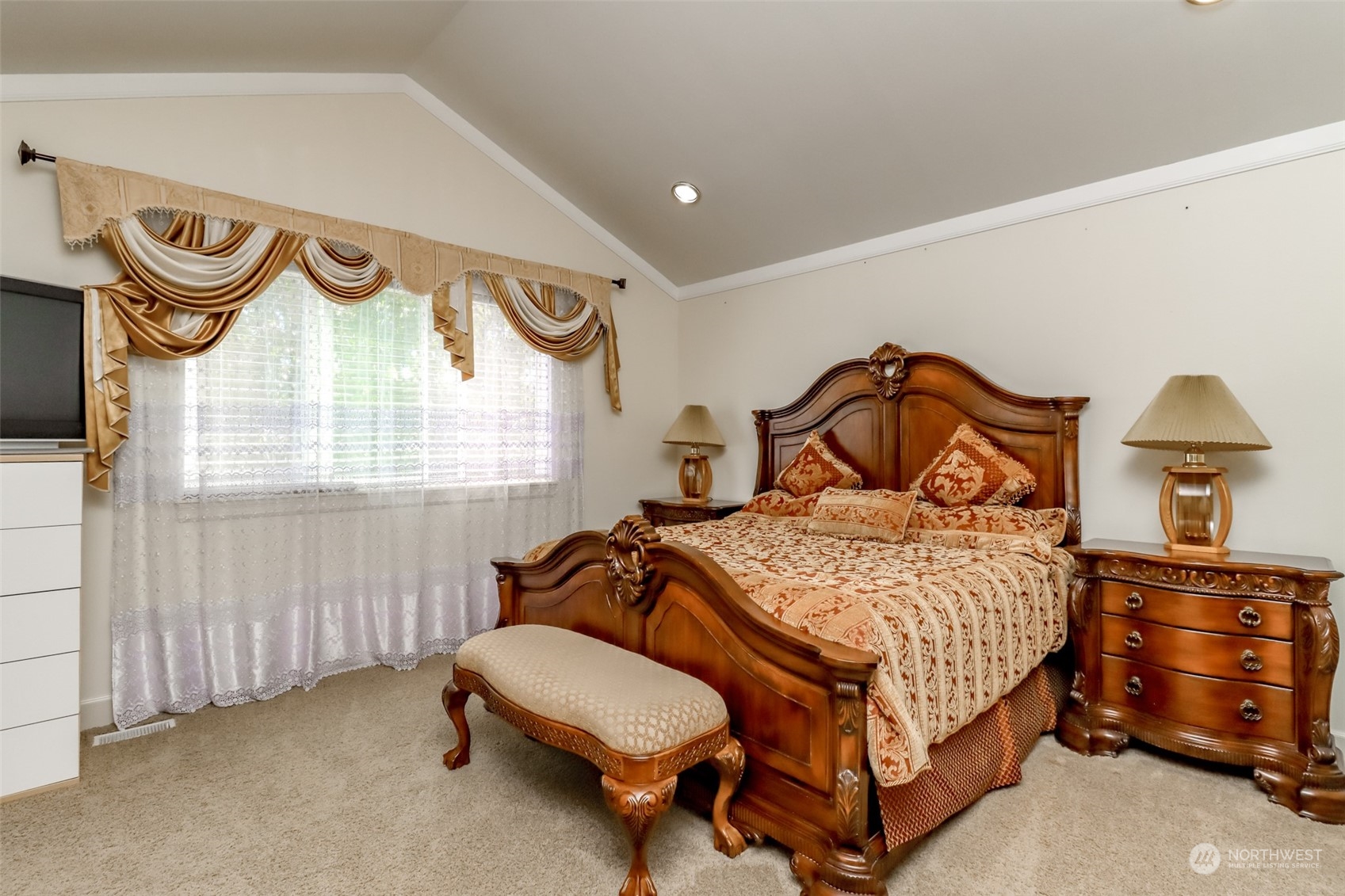 2925 Northeast 8th Street Renton, WA 98056 - Photo 9 of 15 a bedroom with a bed a dresser and window