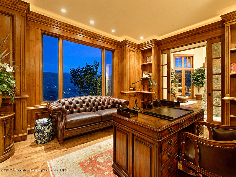 360 Eagle Pines Drive Aspen, CO 81611 - Photo 18 of 40 a bedroom with furniture and large windows