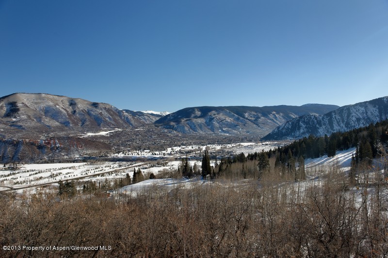 360 Eagle Pines Drive Aspen, CO 81611 - Photo 38 of 40 a view of a lake in middle of the road