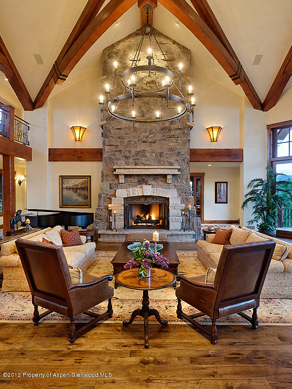 360 Eagle Pines Drive Aspen, CO 81611 - Photo 8 of 40 a outdoor living space with furniture and a fireplace