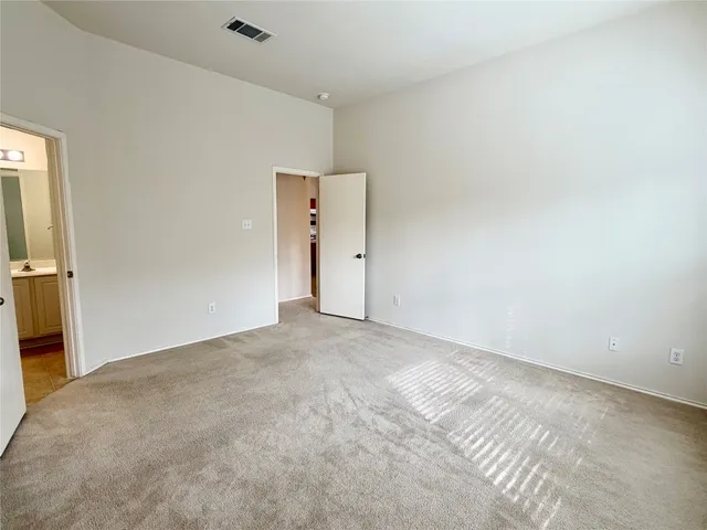 an empty room with a natural light