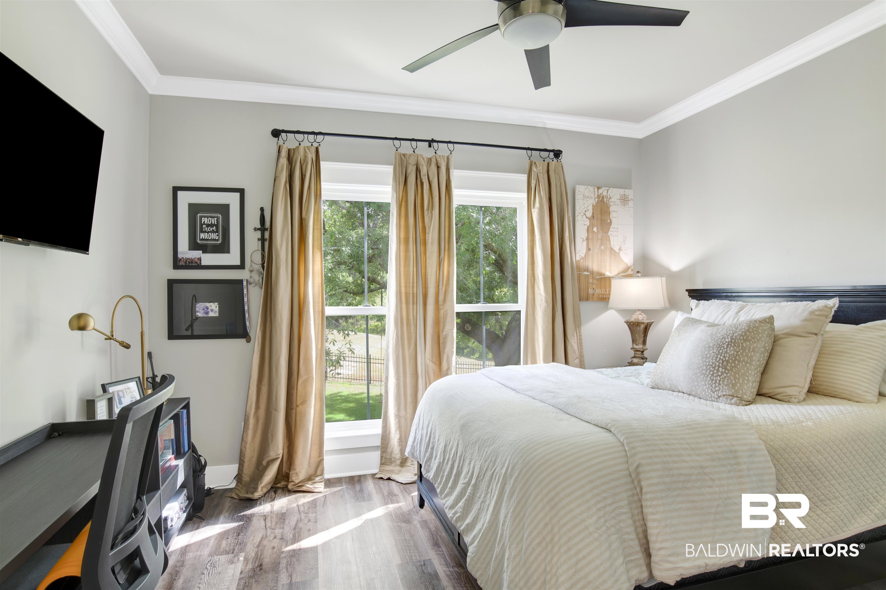 21621 Veranda Boulevard Fairhope, AL 36532 - Photo 8 of 51 Bedroom with crown molding, baseboards, ceiling fan, and wood finished floors