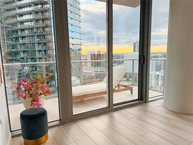 a bathroom with a sink mirror vanity and toilet