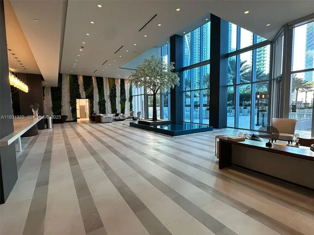 a view of a chairs and table in the patio