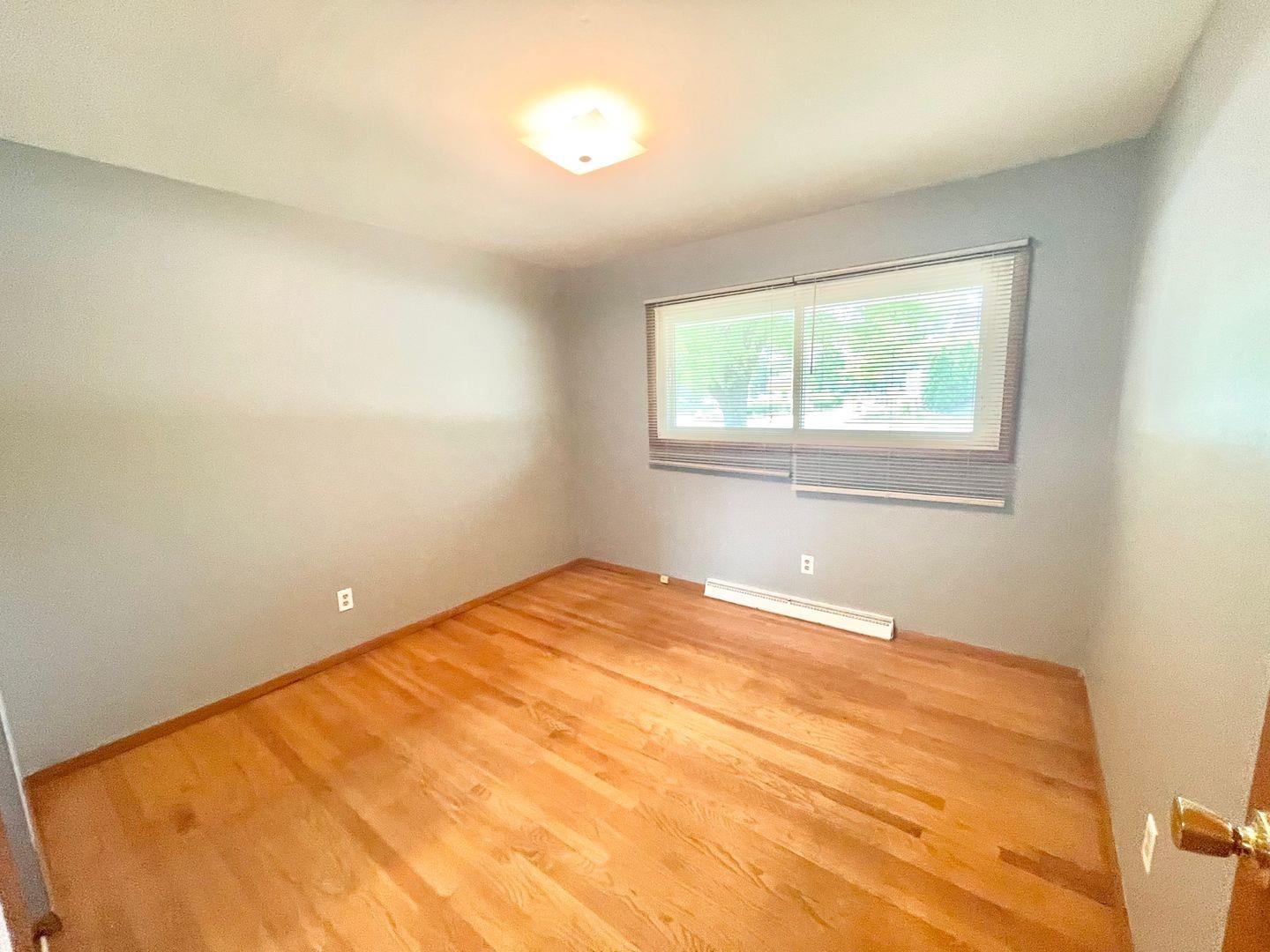 5201 Harrison Street Gary, IN 46410 - Photo 6 of 11 an empty room with a window