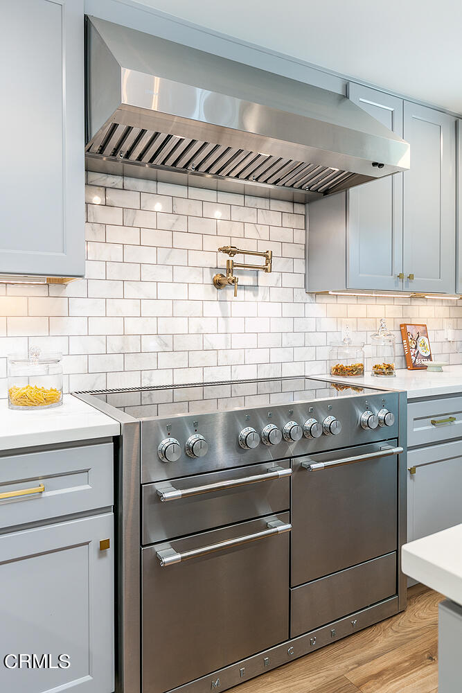 3333 Yorkshire Road Pasadena, CA 91107 - Photo 12 of 34 a stove top oven sitting inside of a kitchen