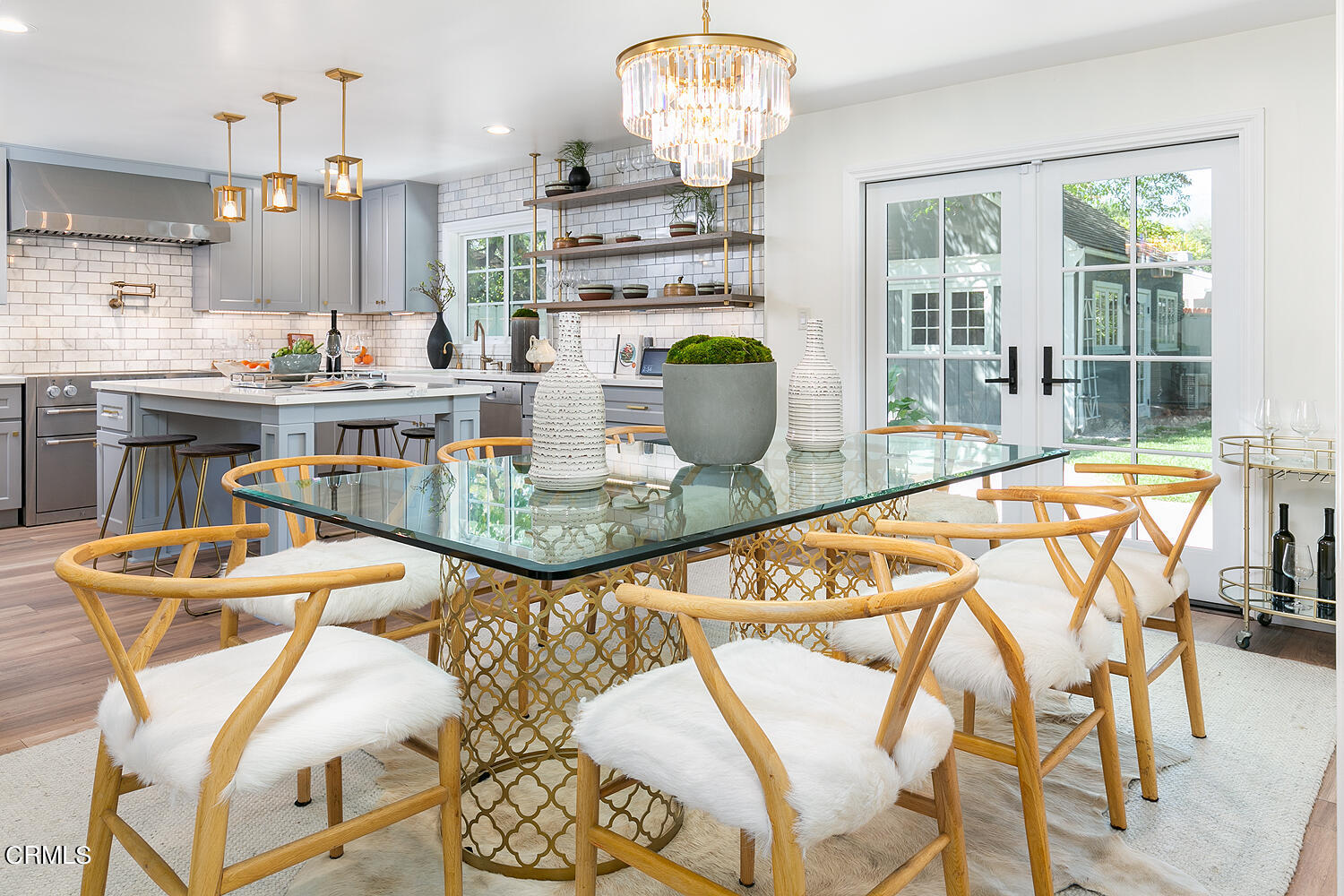 3333 Yorkshire Road Pasadena, CA 91107 - Photo 8 of 34 a kitchen with stainless steel appliances granite countertop a table chairs and a chandelier