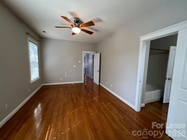 a view of room with racks on the wall