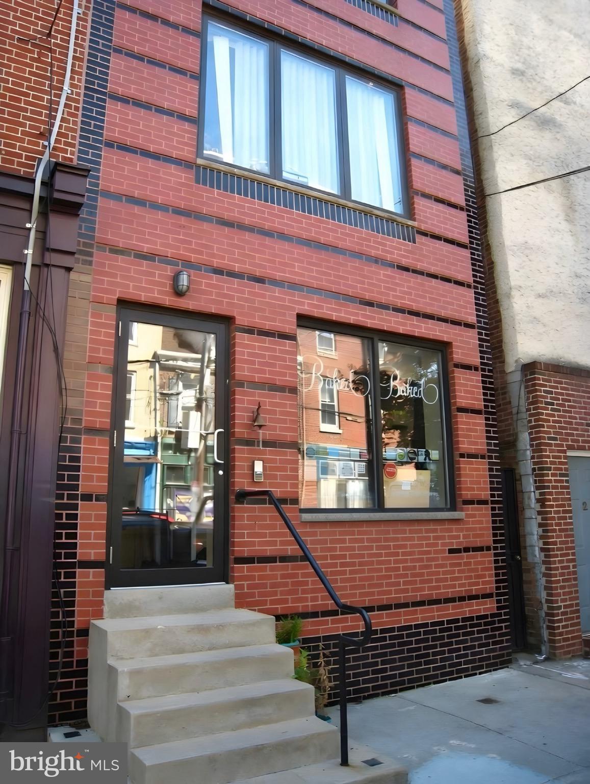 815 South 4th Street Philadelphia, PA 19147 - Photo 1 of 10 a view of a building with a porch