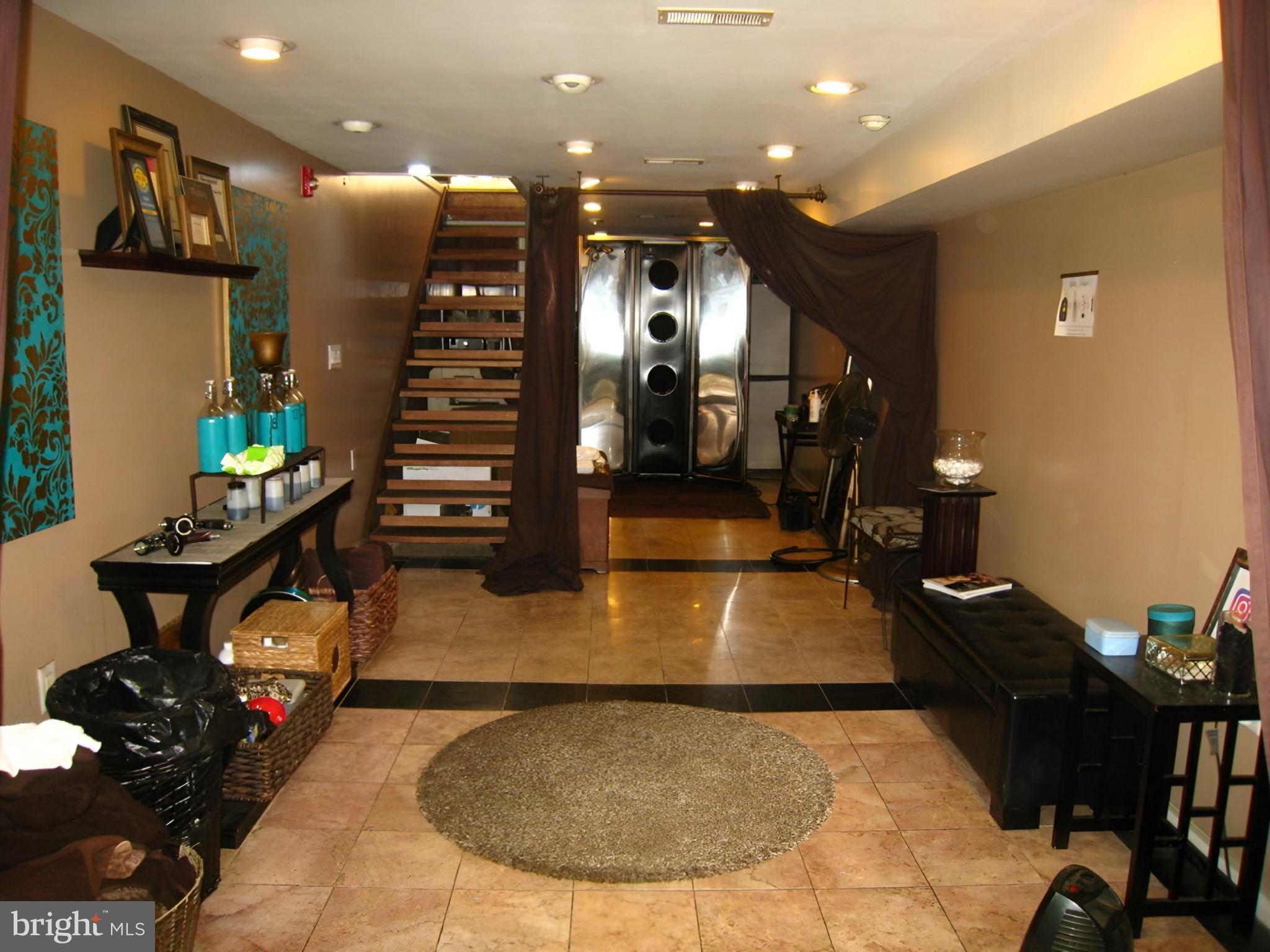 815 South 4th Street Philadelphia, PA 19147 - Photo 3 of 10 a room with lots of chairs and mirrors