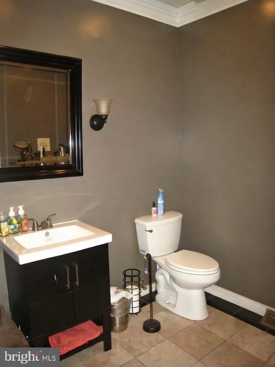 815 South 4th Street Philadelphia, PA 19147 - Photo 9 of 10 a bathroom with a sink and a toilet