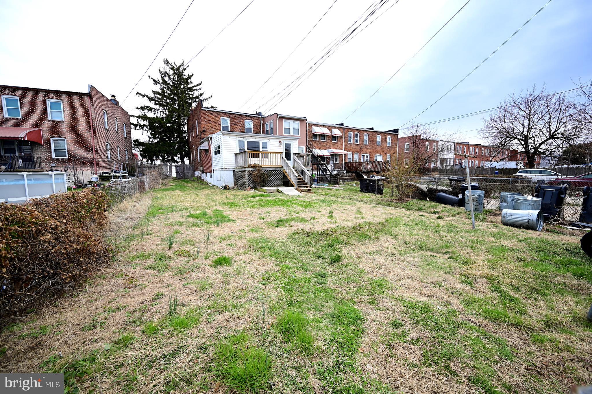 2952 Sollers Point Road, Unit B Dundalk, MD 21222 - Photo 37 of 37 a view of a yard with a house in the background