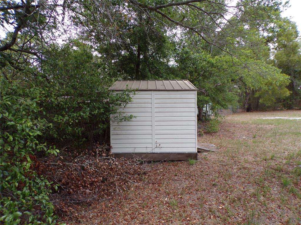 3239 Morrison Way Spring Hill, FL 34606 - Photo 5 of 17 a view of a backyard