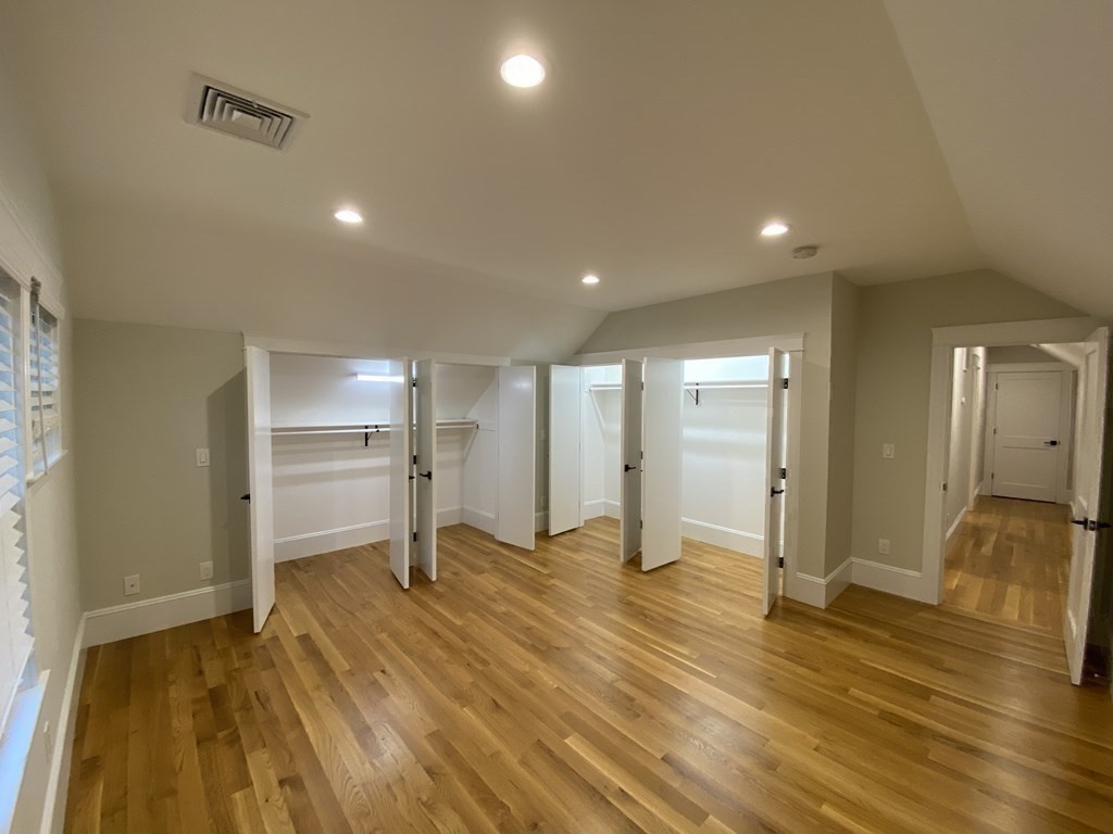 26 Playstead Road, Unit 2 Newton, MA 02458 - Photo 11 of 27 a view of empty room with wooden floor