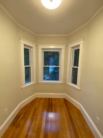 a view of a hallway with washer and dryer