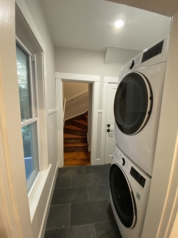 26 Playstead Road, Unit 2 Newton, MA 02458 - Photo 24 of 27 a view of a hallway with washer and dryer