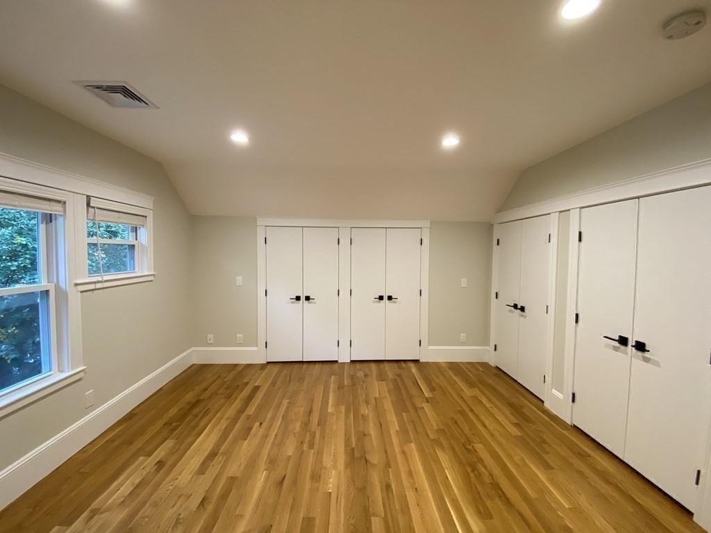 26 Playstead Road, Unit 2 Newton, MA 02458 - Photo 9 of 27 a view of a room with wooden floor and window