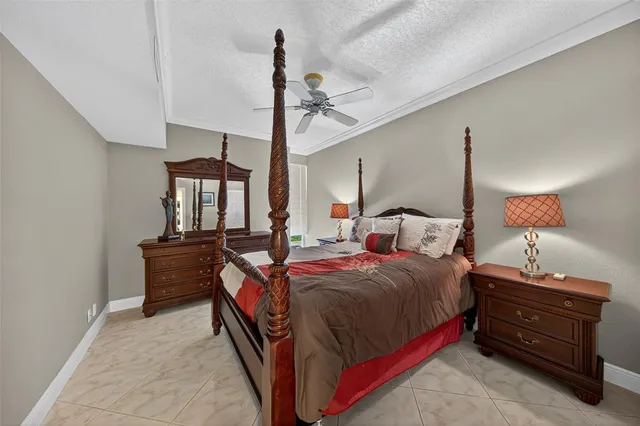 a view of a patio with a table and chairs