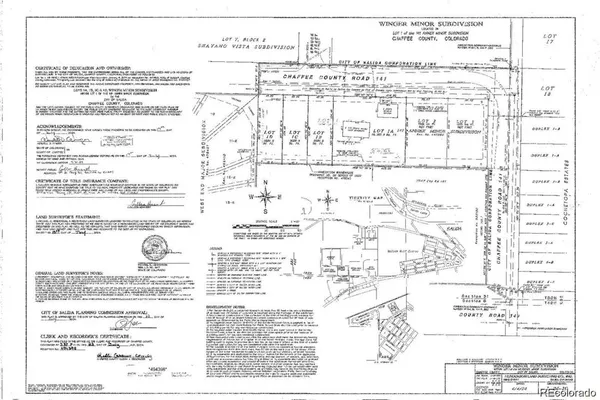 a view of a chairs and table in the patio