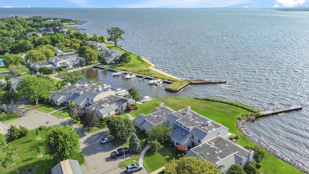 an aerial view of a house with a swimming pool