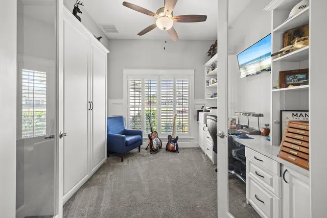 a view of bedroom with furniture and wooden floor