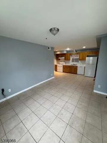 a view of a kitchen with a sink