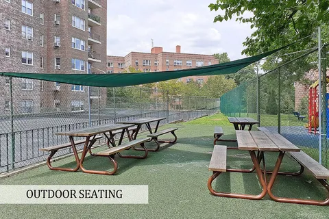 a view of a balcony with chairs