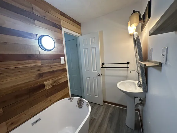 a bathroom with a toilet and a sink