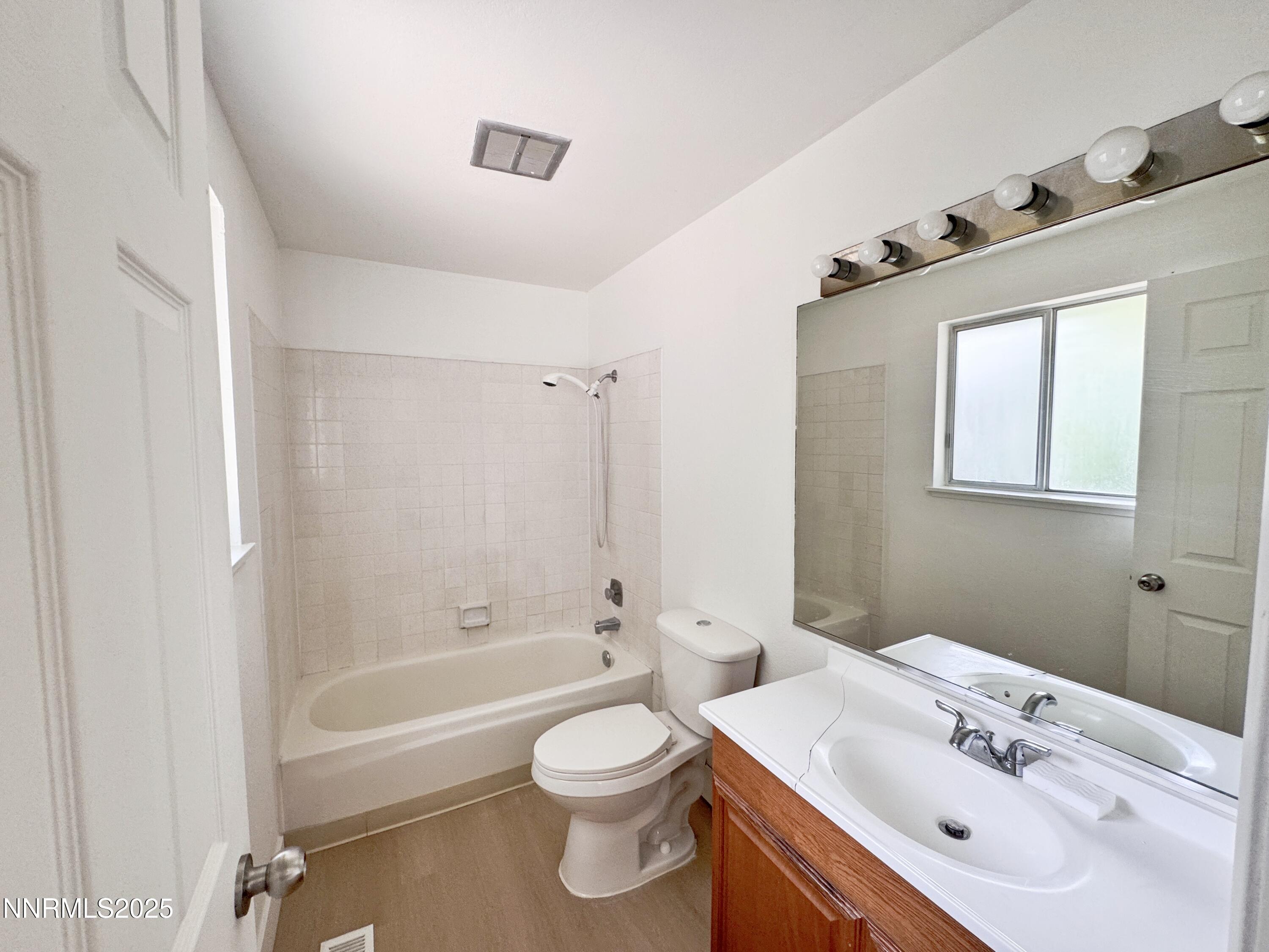 4205 Santa Maria Drive Reno, NV 89502 - Photo 18 of 23 a bathroom with a sink a toilet and shower